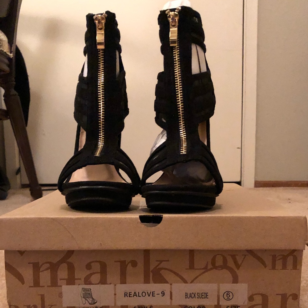 Black heels with gold zipper